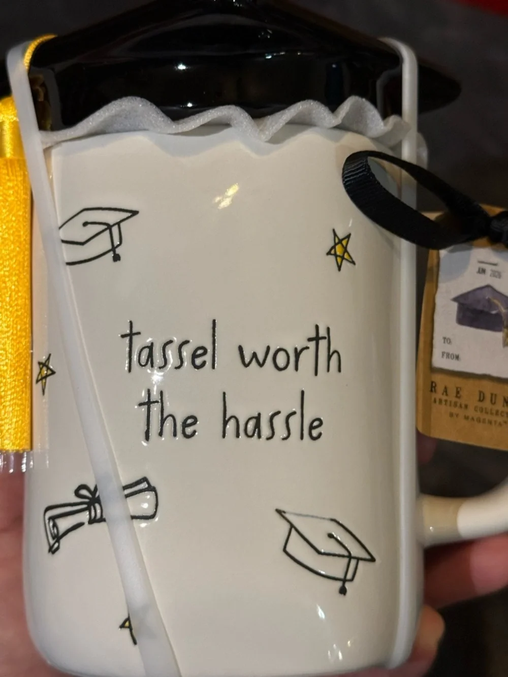 Rae Dunn white ceramic graduation mug with black cap lid and yellow tassel - Picture 3 of 7